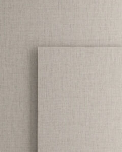 Grey 10x10cm laminate with linen structure on both sides.