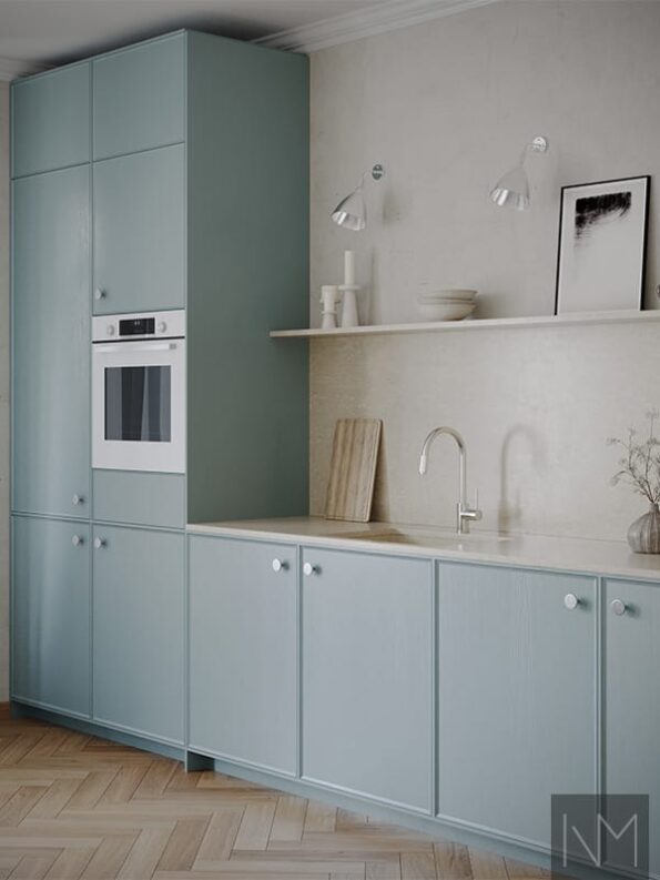 Enigma Kitchen fronts painted in Farrow and ball Hazy NO. CC6. Plate knobs.