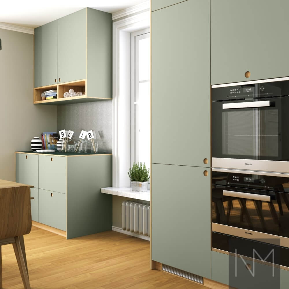 Kitchen fronts in Linoleum Circle design. Colour 4184 Olive.