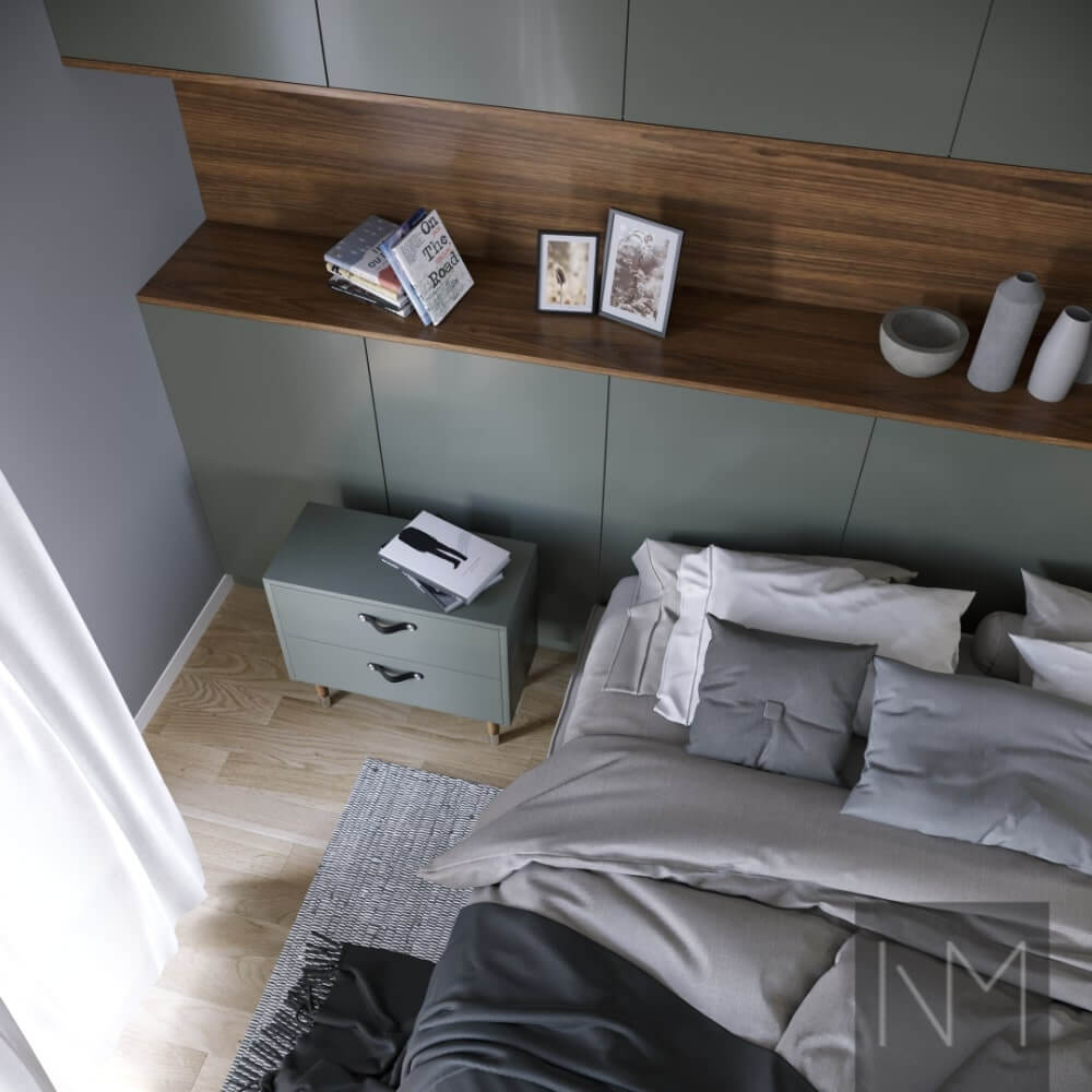 Metod fronts in Jotun Northern Mystic 7613. Nightstand with Cone 17 legs stained in walnut. Black Maraton handles.