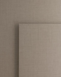 Brown 10x10cm laminate with linen structure on both sides.