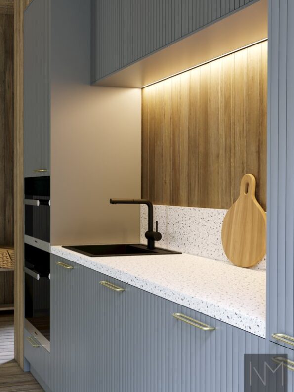 Pure Skyline design for kitchen and wardrobe. Color light grey, handles in Charm X brushed brass