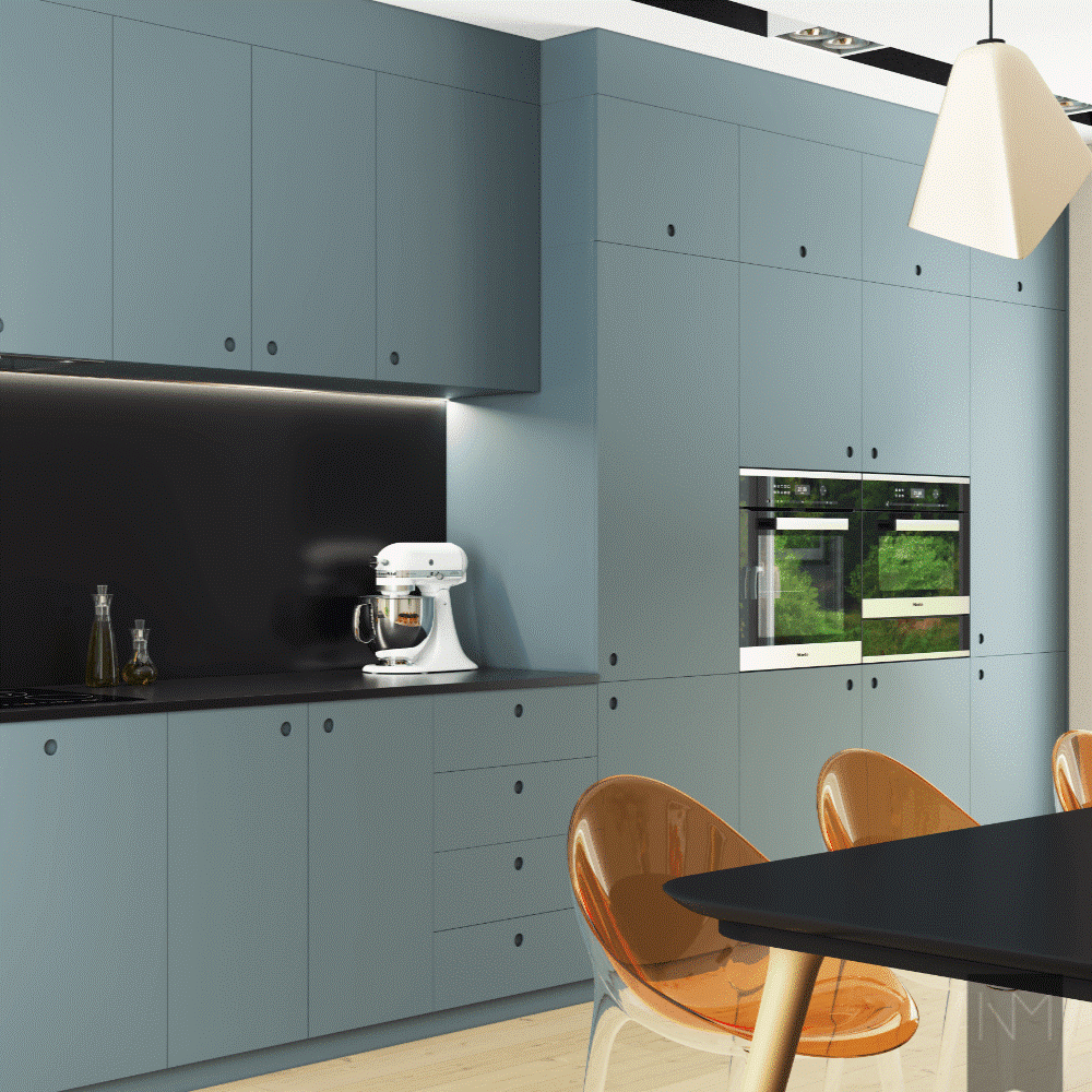 Blue kitchen cabinets with built in appliances in a modern space. 