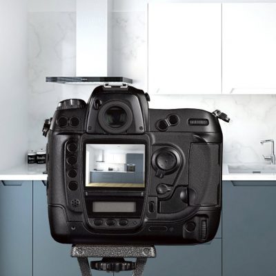 Camera set up to take picture of kitchen